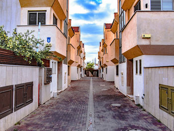 View of residential buildings against sky