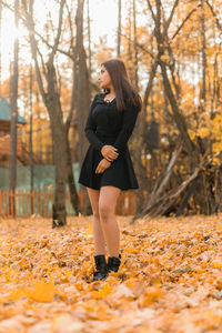 Full length of woman standing on field