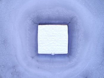 Close-up of snow covered window
