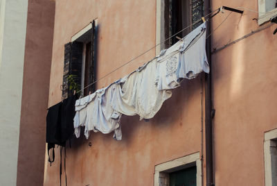 Clothes drying against building