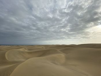 Scenic view of desert against sky