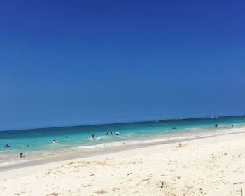 Scenic view of sea against blue sky