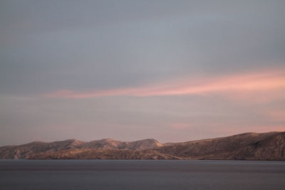 Scenic view of mountains against sky during sunset