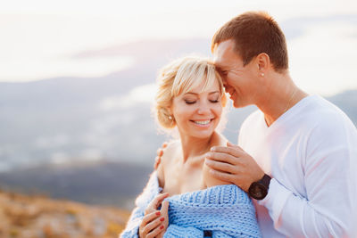 Young couple kissing outdoors