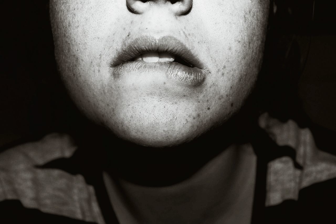 headshot, close-up, lifestyles, human face, indoors, young adult, person, leisure activity, front view, young women, contemplation, focus on foreground, serious, head and shoulders, looking at camera, portrait