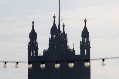 Low angle view of cathedral against cloudy sky