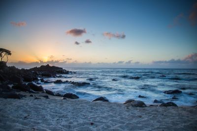 Scenic view of sea against sky during sunset