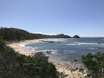 Scenic view of sea against clear blue sky