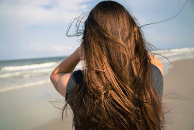 Close-up of woman looking at sea