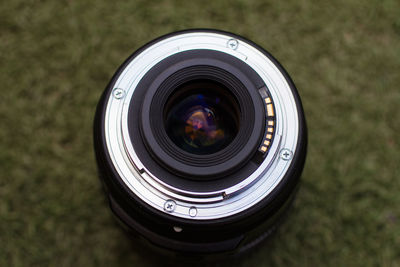 High angle view of camera lens on land