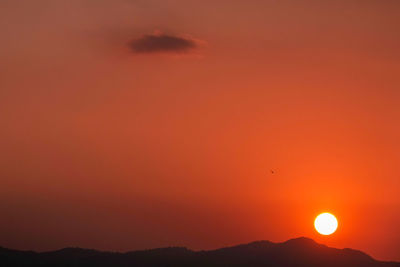 Scenic view of orange sky