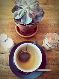 High angle view of coffee cup on table