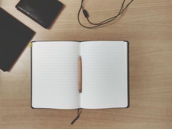 High angle view of open book on table