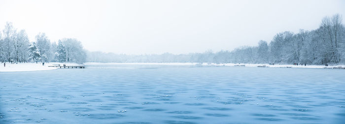 Scenic view of frozen lake against clear sky
