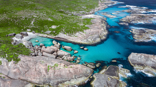 Aerial image of elephant rocks and green pools in denmark, western australia.