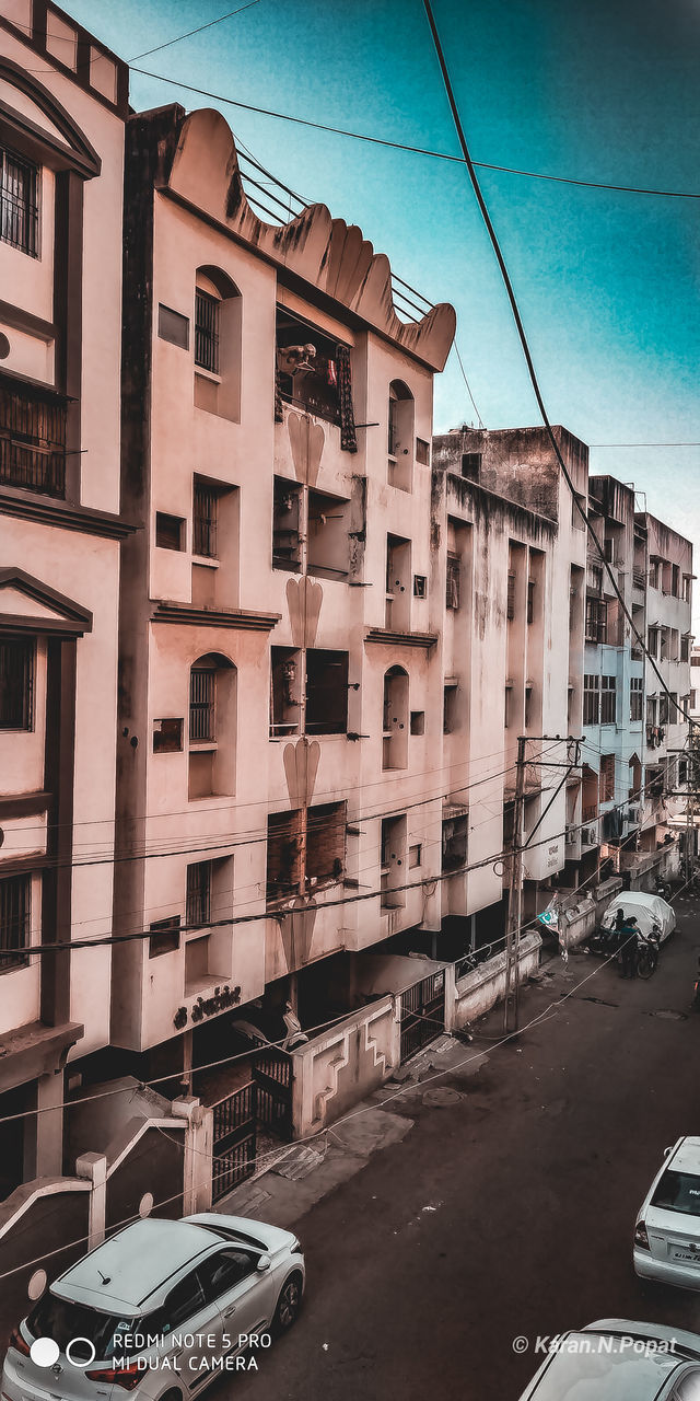 RESIDENTIAL BUILDINGS AGAINST SKY