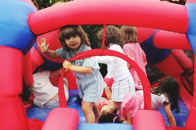 Girls enjoying in bouncy castle