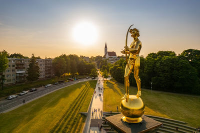 Statue against sky during sunset
