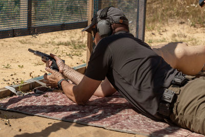 Man practicing target shooting