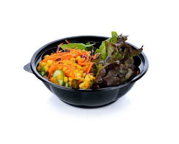 High angle view of food in bowl on white background