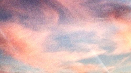 Low angle view of dramatic sky during sunset