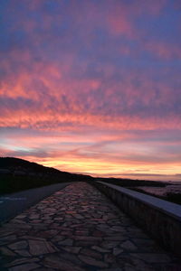 Scenic view of dramatic sky during sunset