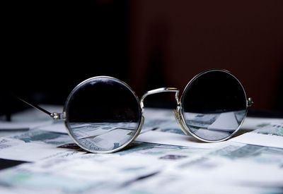 Close-up of sunglasses on table