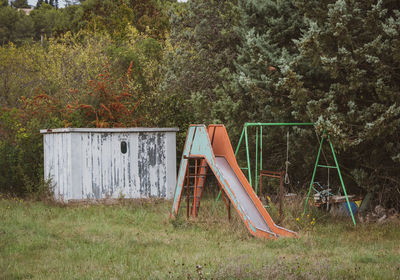 Rusty metallic structure on field