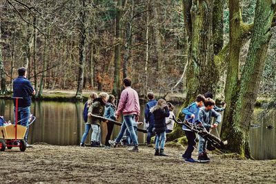 People standing in forest