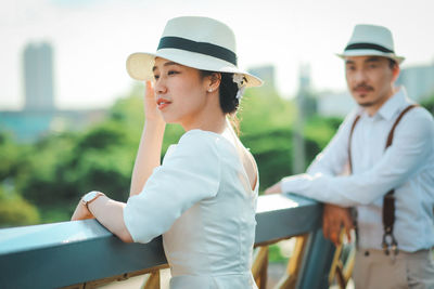 Side view of young woman looking away