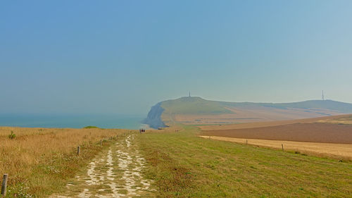 Scenic view of land against clear sky