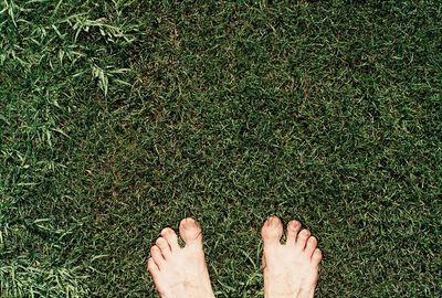 Low section of person standing on ground