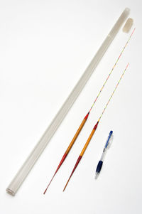 Close-up of colored pencils on white background