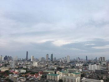 High angle view of modern buildings against sky