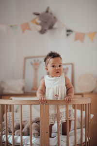 Portrait of cute baby at home