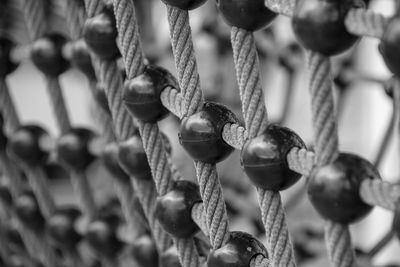 Close-up of rope tied to metal