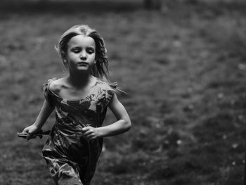 Girl running on field