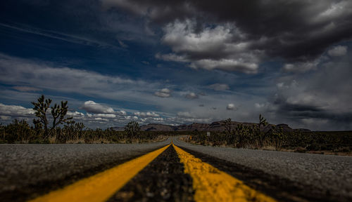 Surface level of road against sky