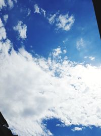 Low angle view of clouds in blue sky