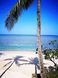 Scenic view of sea against clear blue sky