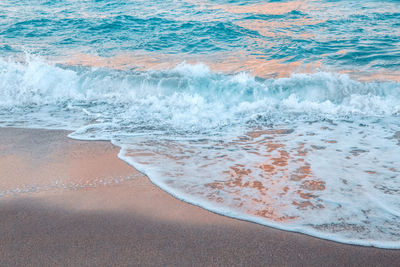 Sea ocean wave water with white foam. sea sandy beach outdoors. natural water aquatic blue ba