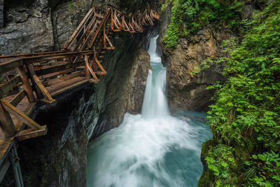 Scenic view of waterfall in forest