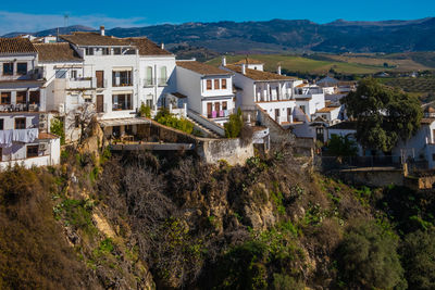 Houses built on the edge of the cliff, in the ancient city of ronda, spain.