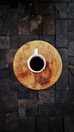 Directly above shot of coffee cup on table