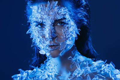 Close-up of statue against blue background