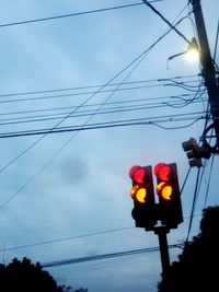 Low angle view of electricity pylon