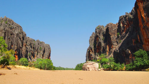 Panoramic view of rock formations against sky