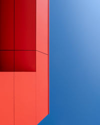 Low angle view of building against clear blue sky