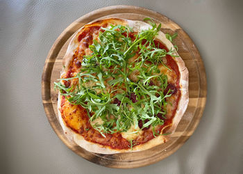 High angle view of pizza in plate on table