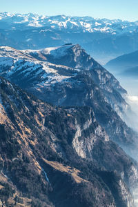 Aerial view of mountains against sky